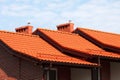 New, modern roof made of red ceramic tiles. Royalty Free Stock Photo