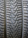 New modern studdable winter tire tread closeup withouts studs