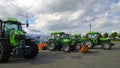 New modern tractors Deutz Fahr in agricultural machinery exhibition. Farmer business and industry. Manufacturing equipment for