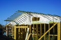 New wooden construction building in the construction process, roofing with waterproofing film
