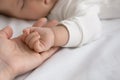 New mom and newborn baby hands close up Royalty Free Stock Photo