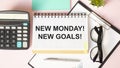 New Monday New Goals Concept on office desktop top view with