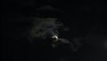 New Moon and Clouds in the Pitchblack Sky Royalty Free Stock Photo