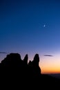 New moon over the mountains ,silhouette of tree and mountains after sunset ,twilight Royalty Free Stock Photo