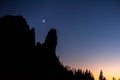 New moon over the mountains ,silhouette of tree and mountains after sunset ,twilight Royalty Free Stock Photo