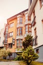 New multi-storey residential building. Modern house dyed in red and orange colors Royalty Free Stock Photo