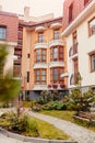 New multi-storey residential building. Modern house dyed in red and orange colors Royalty Free Stock Photo