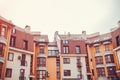 New multi-storey residential building. Modern house dyed in red and orange colors Royalty Free Stock Photo