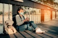 New normal asian girl using smartphone searching the location to travel during the coronavirus outbreak, safe and health care