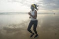 New normal beach running workout of African American woman - young attractive and athletic black girl in face mask training Royalty Free Stock Photo