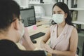 New normal. working woman wearing protection face having friendly conversation