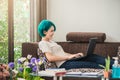 New normal young woman short hair use computer laptop for work from home. Royalty Free Stock Photo