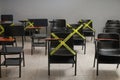 New normality, desks marked with yellow tape indicating social distance, new normality