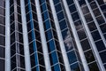 New office futuristic glass abstract background. office glass building architecture. Reflection of the sky in a glass of business Royalty Free Stock Photo