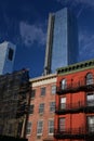 New and old buildings in New York City, NY, USA. Brownstone house detail.