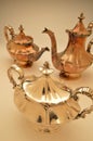 Polished and tarnished pieces of a silver tea set Royalty Free Stock Photo