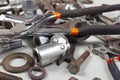 New and old wrenches, nuts, bolts and nuts for mechanical work closeup