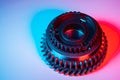 New one metal gears spare parts for gearbox in two colors red and blue. Conceptual image of the mechanical elements of Royalty Free Stock Photo