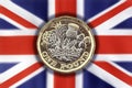 New one pound coin on a Union Jack background Royalty Free Stock Photo