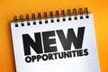 New Opportunities text on notepad, concept background Royalty Free Stock Photo