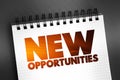 New Opportunities text on notepad, concept background Royalty Free Stock Photo