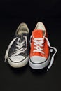 New orange and old blue sneakers Royalty Free Stock Photo