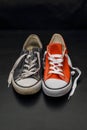 New orange and old blue sneakers Royalty Free Stock Photo