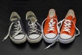 New orange and old blue sneakers Royalty Free Stock Photo