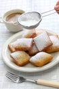 New orleans beignet, sprinkle powdered sugar with sieve