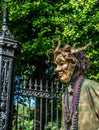 New Orleans French Quarter Street Performer in Mardi Gras Mask Royalty Free Stock Photo
