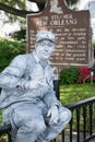 NEW ORLEANS, LA - APRIL 13: Street actor dressed up as a tin man in front of the Steamer historical sign on April 13 Royalty Free Stock Photo