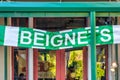 NEW ORLEANS, LA - FEBRUARY 8TH, 2016: Beignets sign at Cafe Du Monde, famous pub Royalty Free Stock Photo