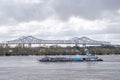 New Orleans, LA / USA - 12/28/19: Barge Travelling Downriver on the Mississippi River in New Orleans
