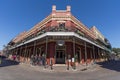 New Orleans, LA/USA - circa February 2016: Old Colonial House with ironwork galleries on the Streets of French Quarter decorated f