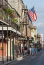 New Orleans, LA/USA - circa March 2009: Old Colonial House with ironwork galleries and american flag