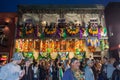 New Orleans, LA/USA - circa March 2011: People throwing beads and watching celebration from balconies during Mardi Gras in New Orl