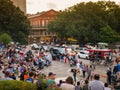 New Orleans, LA USA. December 2019. People watch street entertainers in the famous Washington Artillery Park