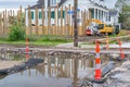 New House Construction and Road Repairs in Uptown Neighborhood