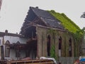 Wrecked or damaged building with moss and brick after Hurricane Katrina