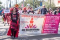 New Orleans, LA/USA - 2/19/2017: Marchers in Mardi Gras Parade on St. Charles Avenue Opposing Violence and Exploitation of women