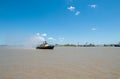 NEW ORLEANS, LOUISIANA - APRIL 10, 2016: Cityscape of New Orleans with Mississippi river. Boat Pouring Water during the French Qua