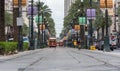 NEW ORLEANS - LOUISIANA, APRIL 11, 2016: Cityscape of New Orleans with Tram And People. Street Life. French Quarter Festival