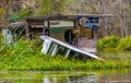 NEW ORLEANS, LOUISIANA - NOVEMBER 27, 2011: Sandy House Broken Down by River Hurricane Sandy, USA