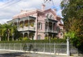 New Orleans, Louisiana, U.S.A - February 8, 2020 - A beautiful pink mansion near The Garden District Royalty Free Stock Photo