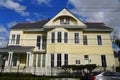 New Orleans, Louisiana, U.S.A - February 4, 2020 - Beautiful yellow mansion on the street by The Garden District Royalty Free Stock Photo