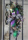 New Orleans, Louisiana, U.S.A - February 8, 2020 - A colorful Mardi Gra decoration on the door