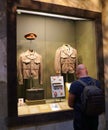 New Orleans, Louisiana, U.S.A. - February 5, 2020 - A visitor checking the old uniforms at World War 2 Museum