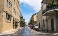 Streets of the ancient French Quarter in New Orleans, Louisiana. The ancient colonial mansions and tourists on the street in New O