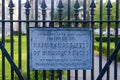 Weather Worn National Register of Historic Places Sign on Iron Gate