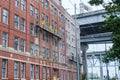 Window Cleaners and Pressure Washer Working on Side of Tall Building in New Orleans Royalty Free Stock Photo